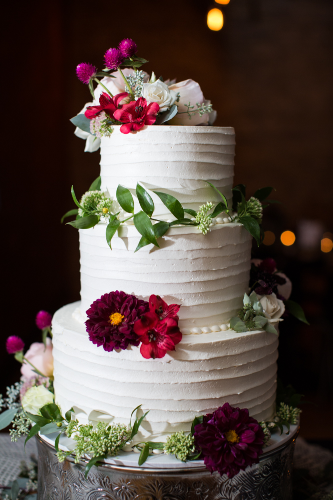 Wedding Cake Decorated with Flowers from Belle Fiori in Milwaukee